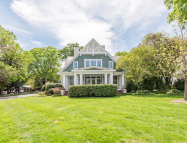 203 North Main Street, a pastel green two-story home in Belmont North Carolina.